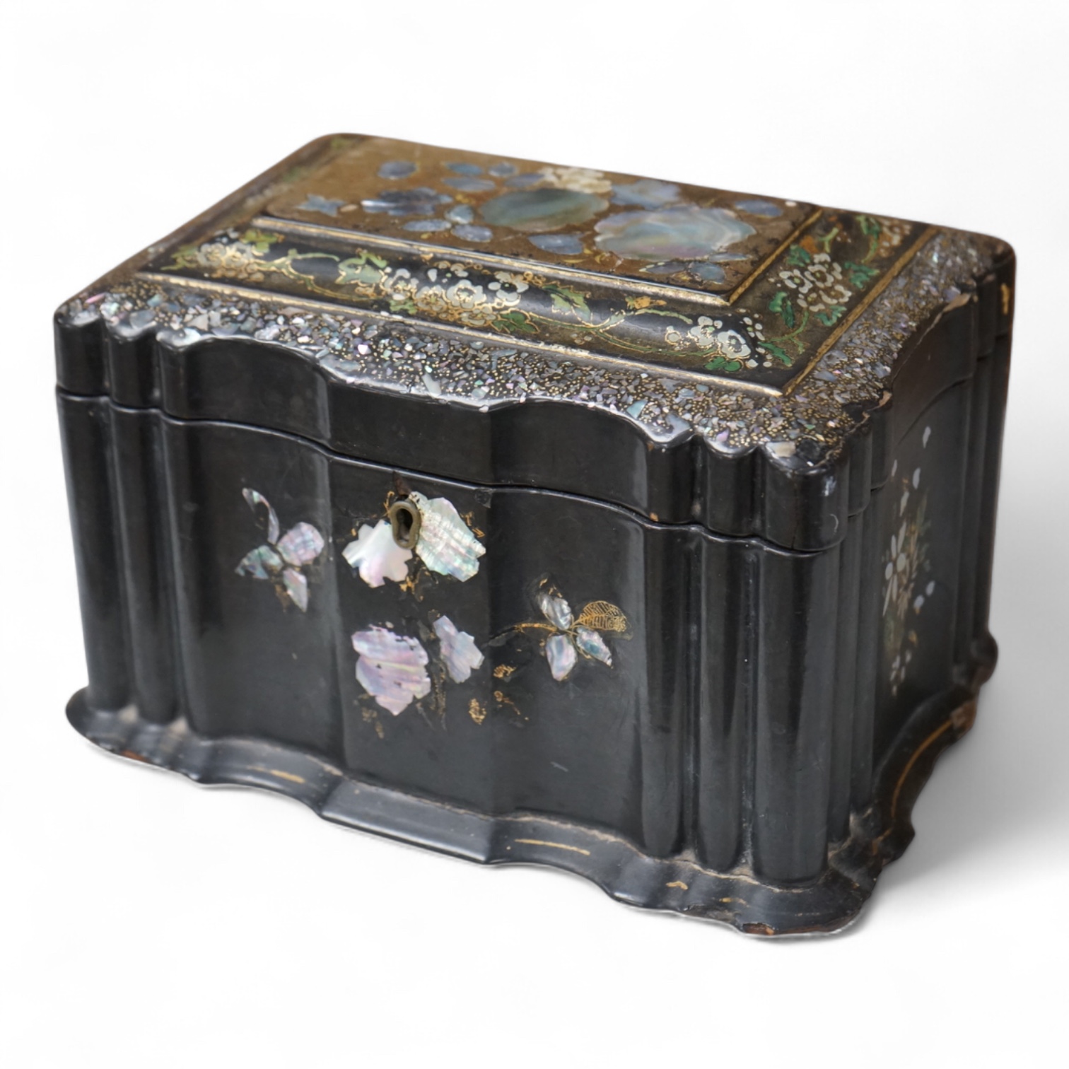 A Victorian Jennens & Bettridge papier mache tea caddy with abalone inlay, 21cm wide